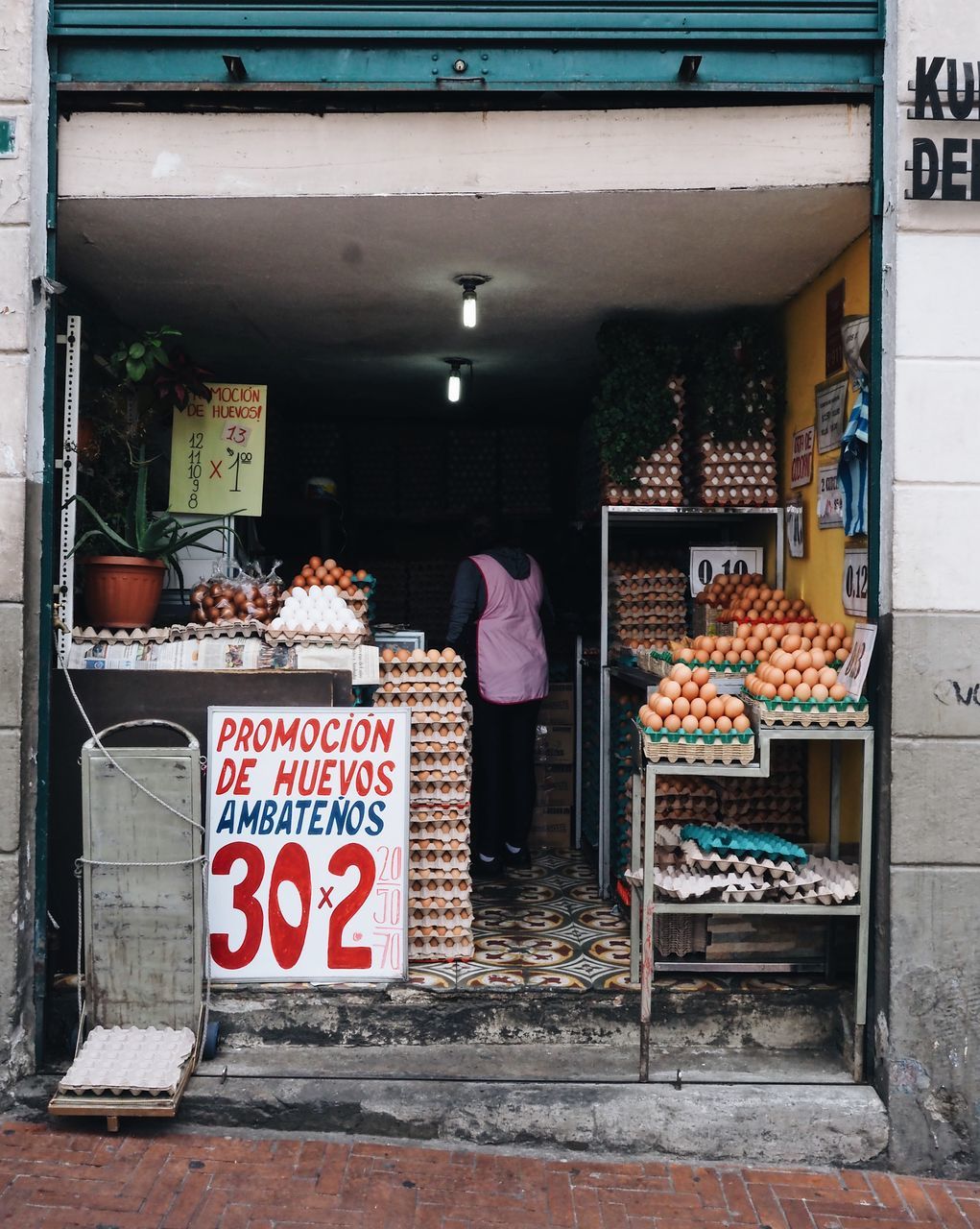 INFORMATION SIGN IN MARKET STALL