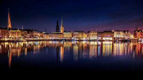 Illuminated buildings at waterfront