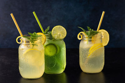 Close-up of lemon with drink