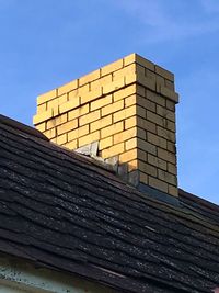 Low angle view of roof against clear sky