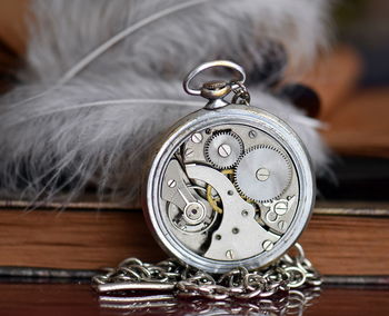 Close-up of clock on table