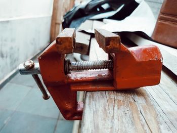 Close-up of rusty metal on table