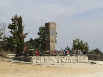 View of tower against cloudy sky