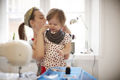 Mother and daughter at home