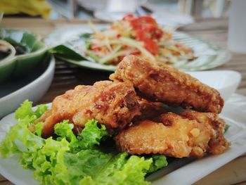 Close-up of food served on table