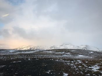 Snow covered mountain against sky