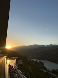 High angle view of buildings against sky during sunset