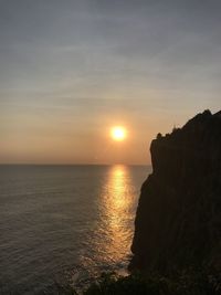 Incredible sunset at uluwatu temple cliff