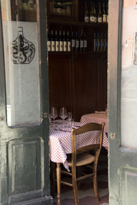 Empty chairs and tables in cafe