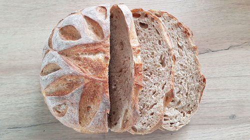 High angle view of bread on cutting board