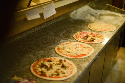 Preparing and cooking pizza in the wood copper oven