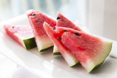 Close-up of sliced slices in plate on table