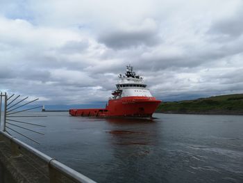 Ship in sea against sky