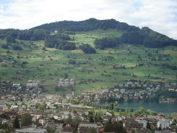 Scenic view of mountains against cloudy sky