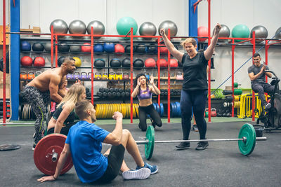 Low section of man exercising in gym