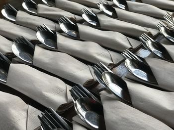 High angle view of spoon and fork on table