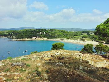 Scenic view of sea against cloudy sky