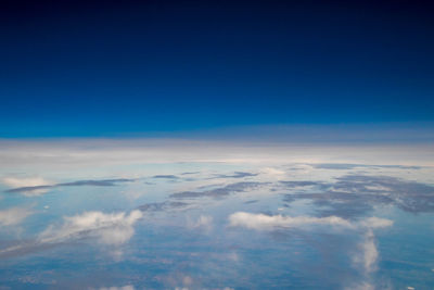 Aerial view of clouds over blue sky