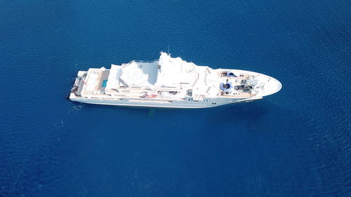 High angle view of sailboat sailing in sea