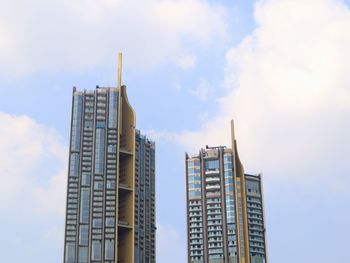 Low angle view of modern building against sky