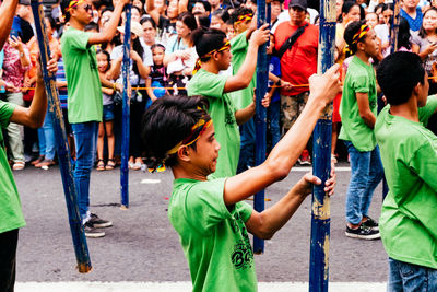 People standing on street in city