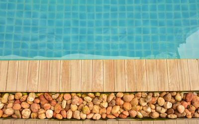 Full frame shot of coffee beans by swimming pool