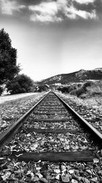 Railroad track passing through landscape