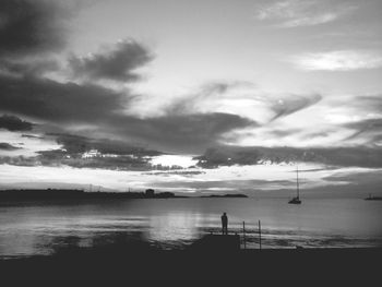 Scenic view of sea against cloudy sky