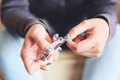 Midsection of man holding key