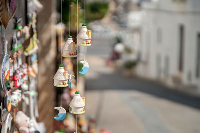 Close-up of hanging for sale in market