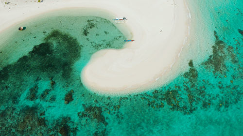 High angle view of drink on beach