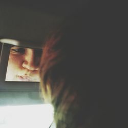 Close-up of woman using mobile phone