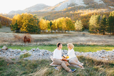 People sitting on grass