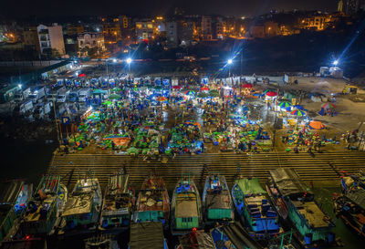 High angle view of illuminated market at night