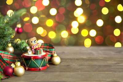 Illuminated christmas decoration on table