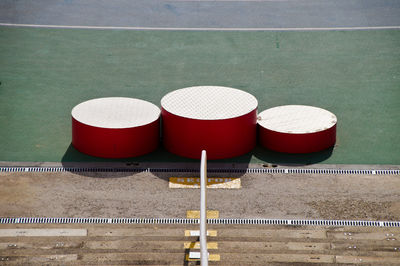 High angle view of empty deck chairs