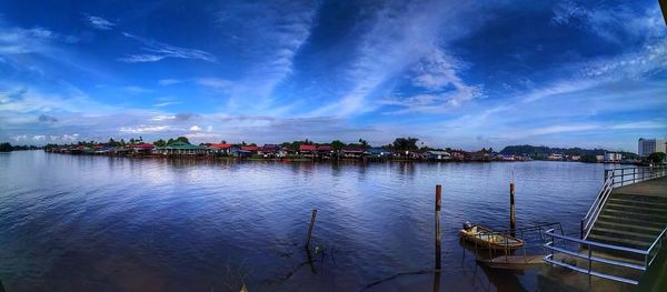 Panoramic view of bay against blue sky