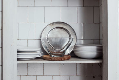 Crockeries in shelf at home