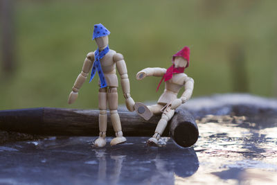 Close-up of wooden figurines on table