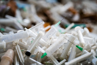 Many dirty syringes and needles