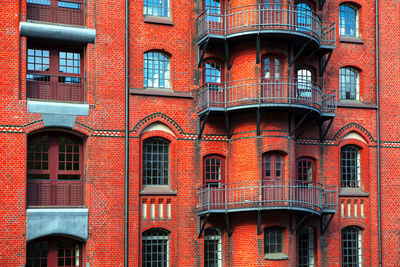 Red bricks house . german typical architecture . residential house with balcony