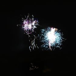 Firework display at night