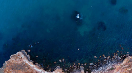 A scenic top-down view over the bolata coast cliff, kaliakra region in bulgaria - aerial drone shot