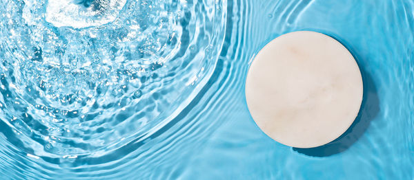 High angle view of drink in swimming pool