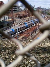 Chainlink fence seen through chainlink fence