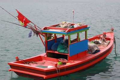 Boat moored in sea