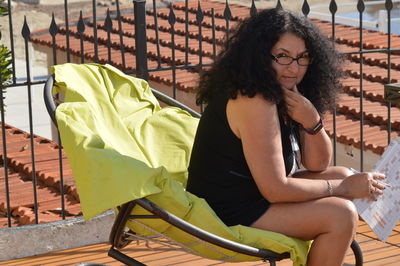 Woman sitting on chair