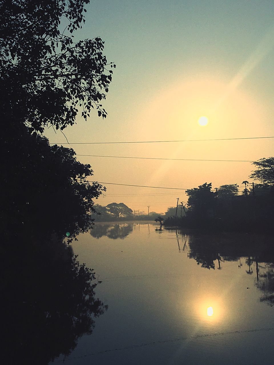 reflection, sunset, water, sky, tranquility, lake, nature, tree, scenics, sun, no people, outdoors, beauty in nature, day