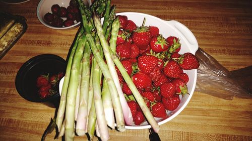 High angle view of strawberries on table