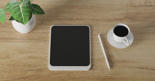 Directly above shot of coffee cup on table